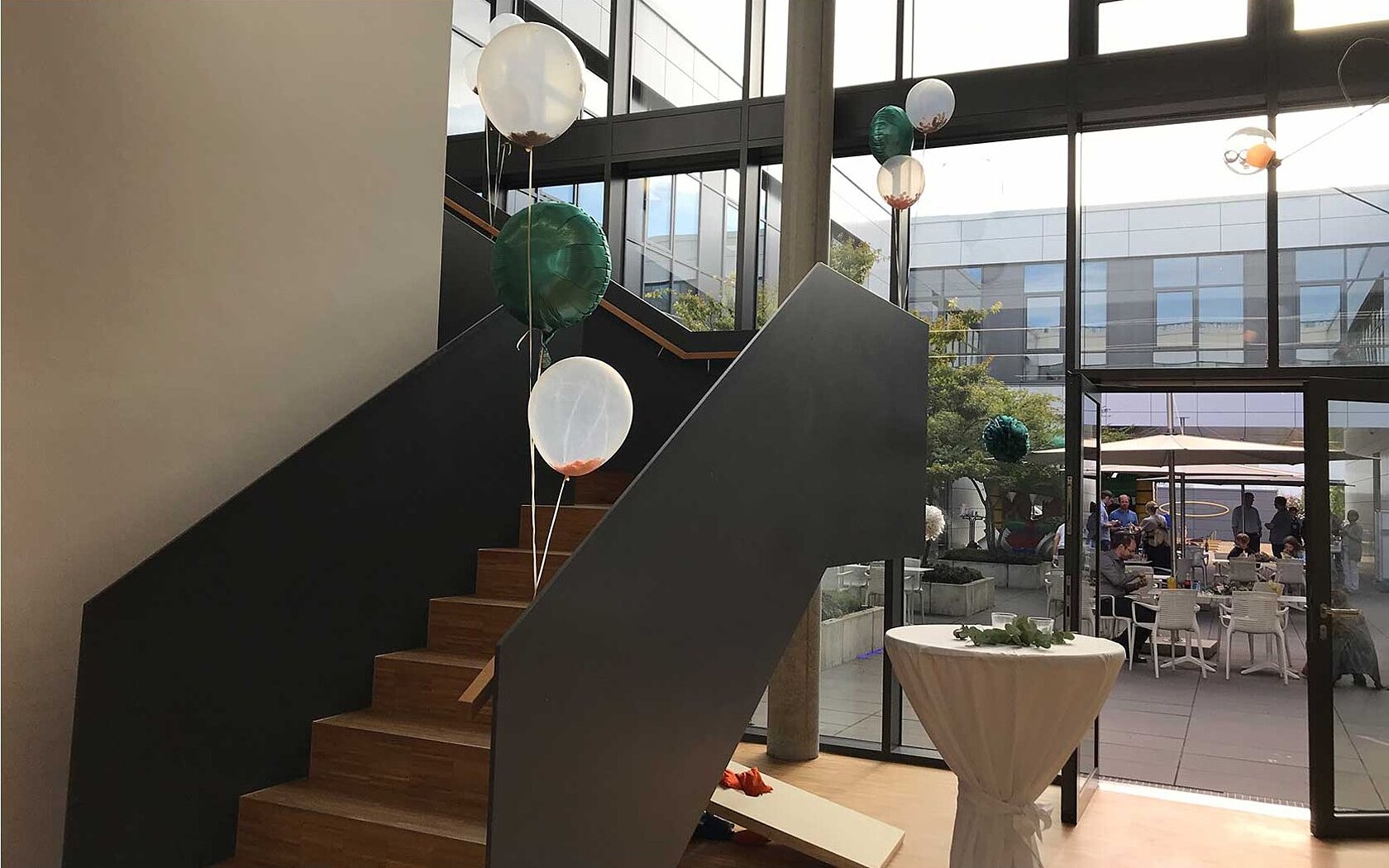 With balloons and pom poms decorated foyer