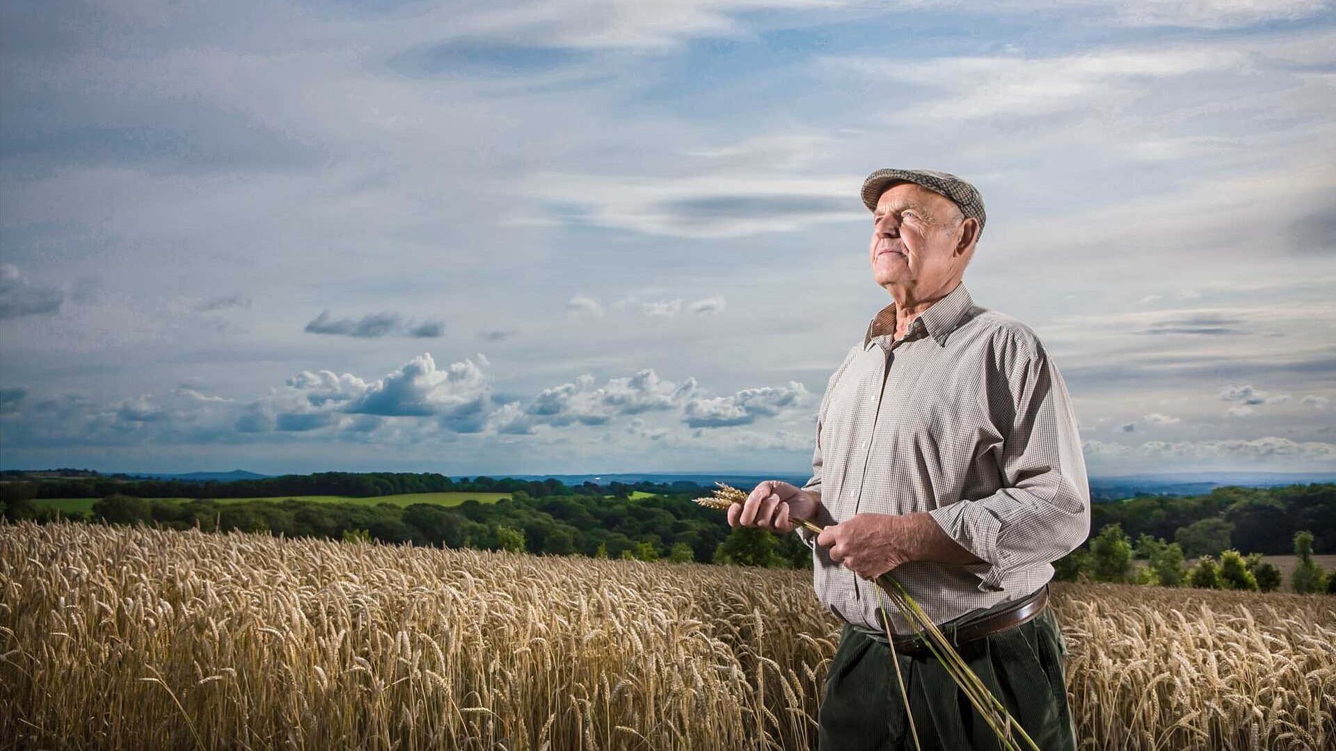 Farmer with grain in his hand
