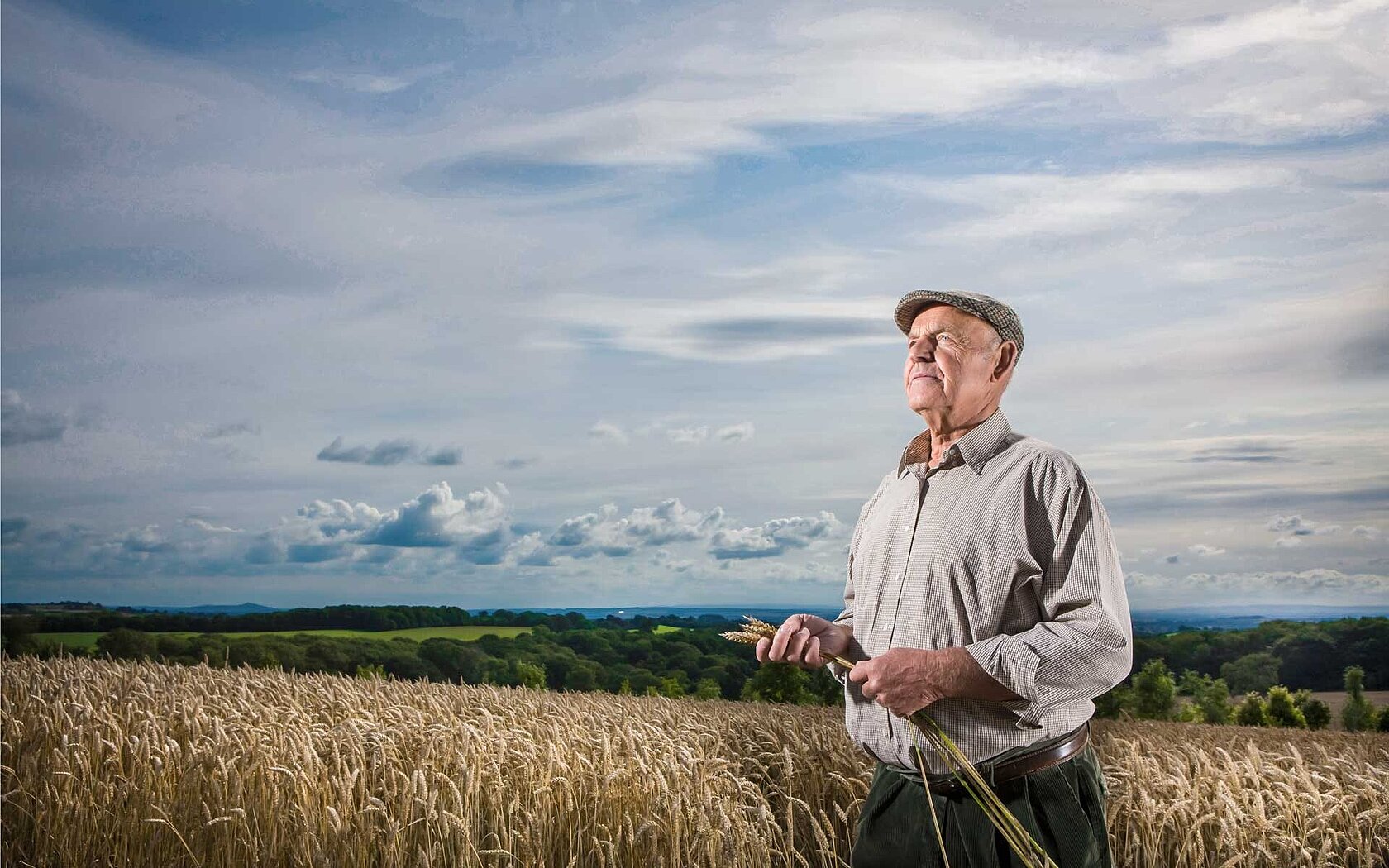 Farmer with grain in his hand