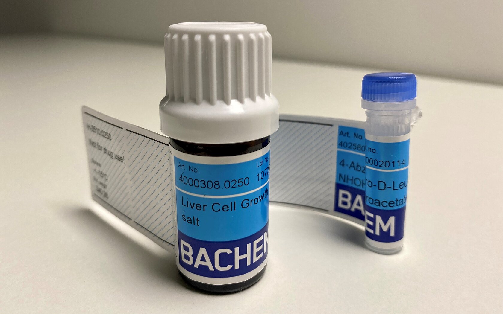 Blue containers with standards from Bachem for net peptide content analysis
