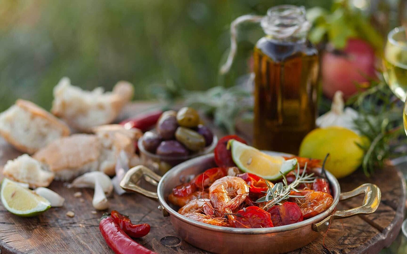 Food plate with prawns and olive oil