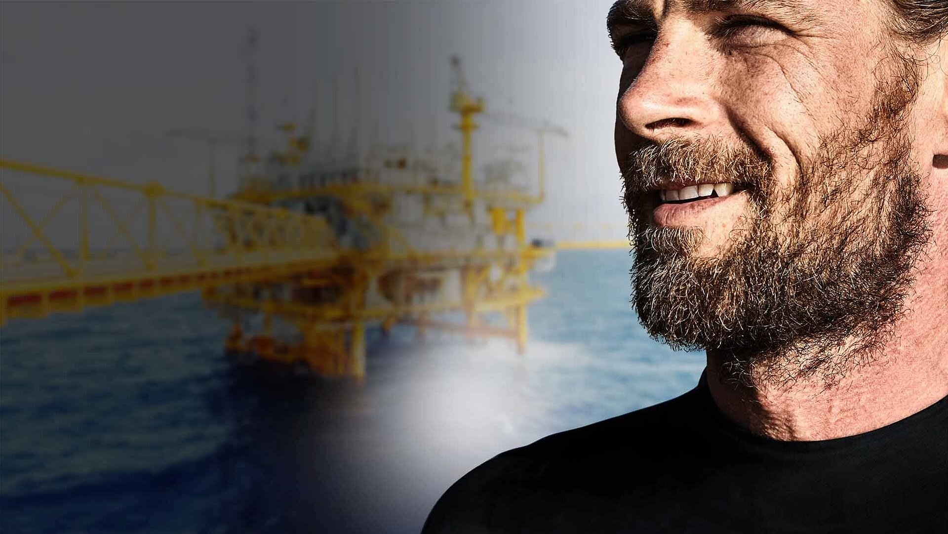 Man in front of an offhore platform