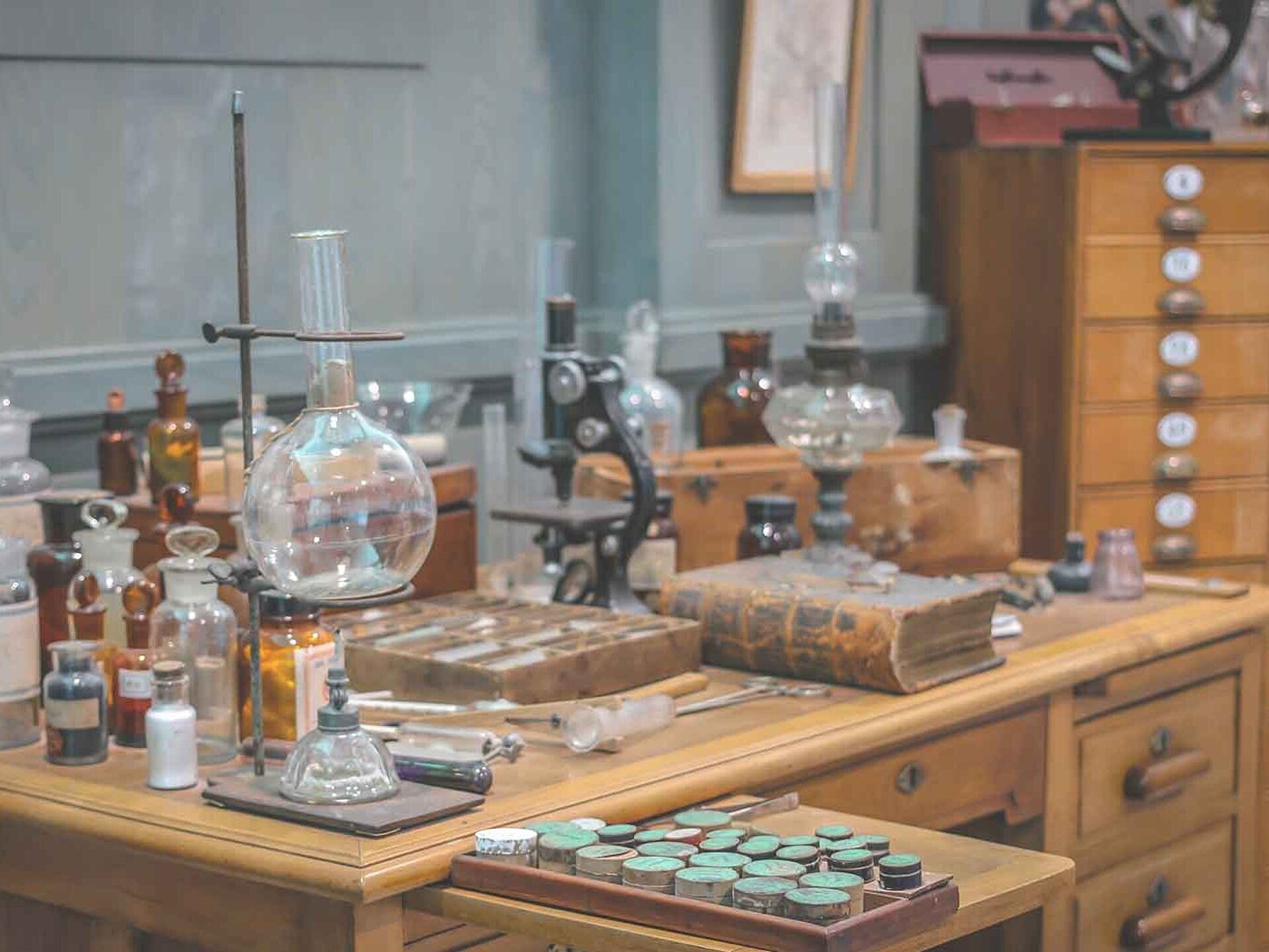 Old science lab with chemicals and burner